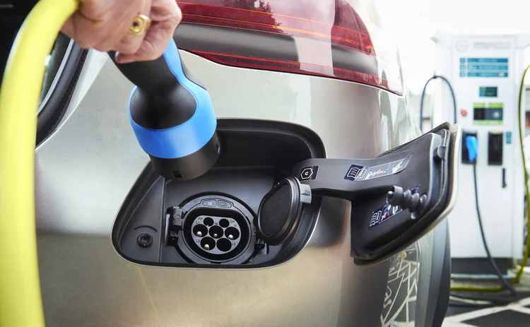 Charging an electric car at an electric vehicle charging station