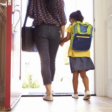 mum taking child to school