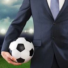 Businessman with football