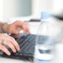 Person working on a laptop at home